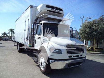 Truck image: 2016 Freightliner M2 106 refrigerated box truck with Thermo King unit on cab top, white cab, side view dealership lot