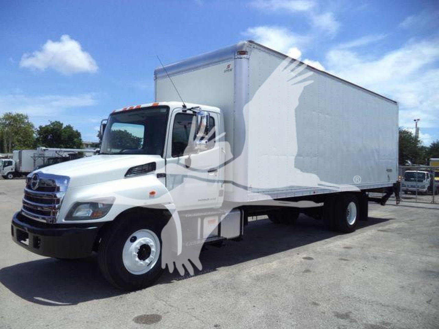 Box truck 2020 Hino 268A side-front view showing cab and cargo box with VIN 5PVNJ8JT5L4S59378 and stock T59378.
