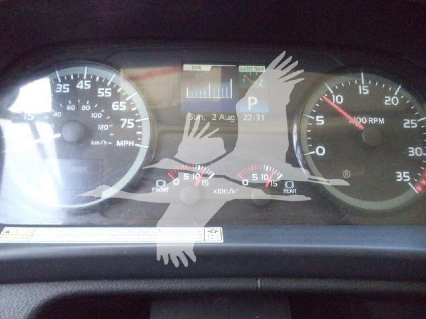 Dashboard of a 2020 Hino 268A showing speedometer, tachometer, and digital display with time and date and a 'P' gear indicator.