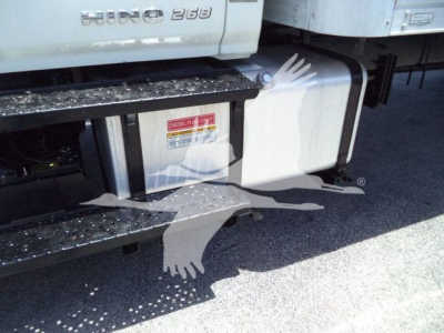 Truck side view showing fuel tank and steps with 'HINO 268' badge and diesel only label.