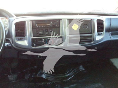 Dashboard of a 2020 Hino 268A box truck showing center console with radio, climate controls, and glove box.