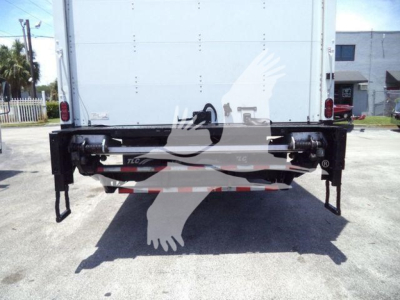 Rear view of a 2020 Hino 268A box truck showing rear underride guard and bumper with taillights, viewed from ground level.