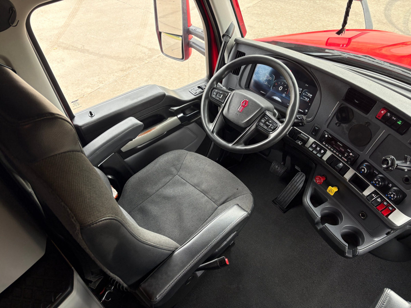 Kenworth T680 cabin dashboard and steering wheel view