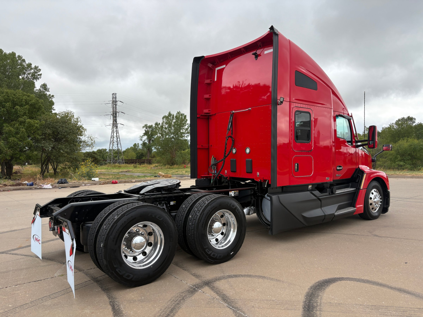 Kenworth T680 tractor rear left side view showing chassis and wheels