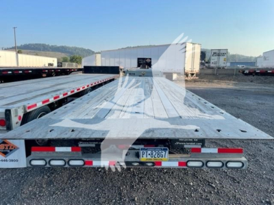 Landoll 440B trailer back view showing flatbed with reflective rear lights and Pennsylvania license plate PT-826G7.