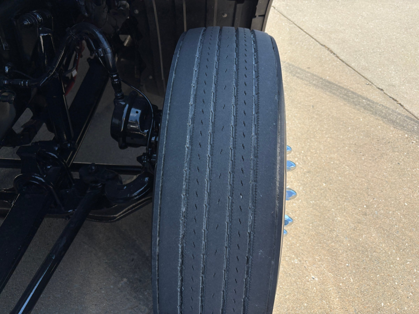 Peterbilt truck wheel/view showing tire and suspension components