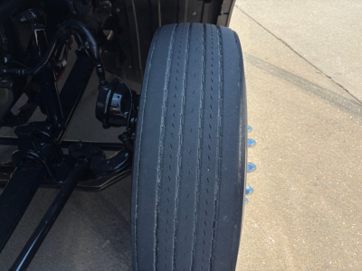 Peterbilt truck wheel/view showing tire and suspension components