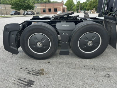 Kenworth T680 wheel dual rear axles showing Twin Buddy wheels and chassis components.