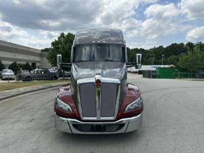Kenworth T680 front view showing grille, headlights, chrome bumper, and bumper badge.