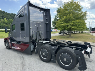 Kenworth T680 truck cab and rear chassis showing raised sleeper section and rear axles