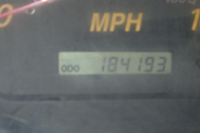 GMC W4500 dashboard odometer showing 184,193 miles.