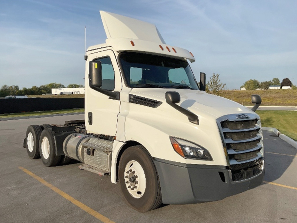 Truck cab front-right view of a 2019 Freightliner Cascadia126 with hood raised for cab inspection, white exterior, 6x4 tractor configuration.