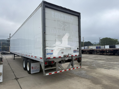 2018 Vanguard Vip 4000 trailer rear view showing dual axles and logging, stock number 7748, VIN 5V8VA532XJT805725.
