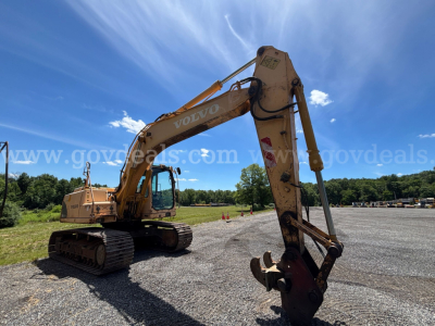 Volvo EC160B excavator in-service showing hydraulic arm and bucket with Volvo branding on the boom.