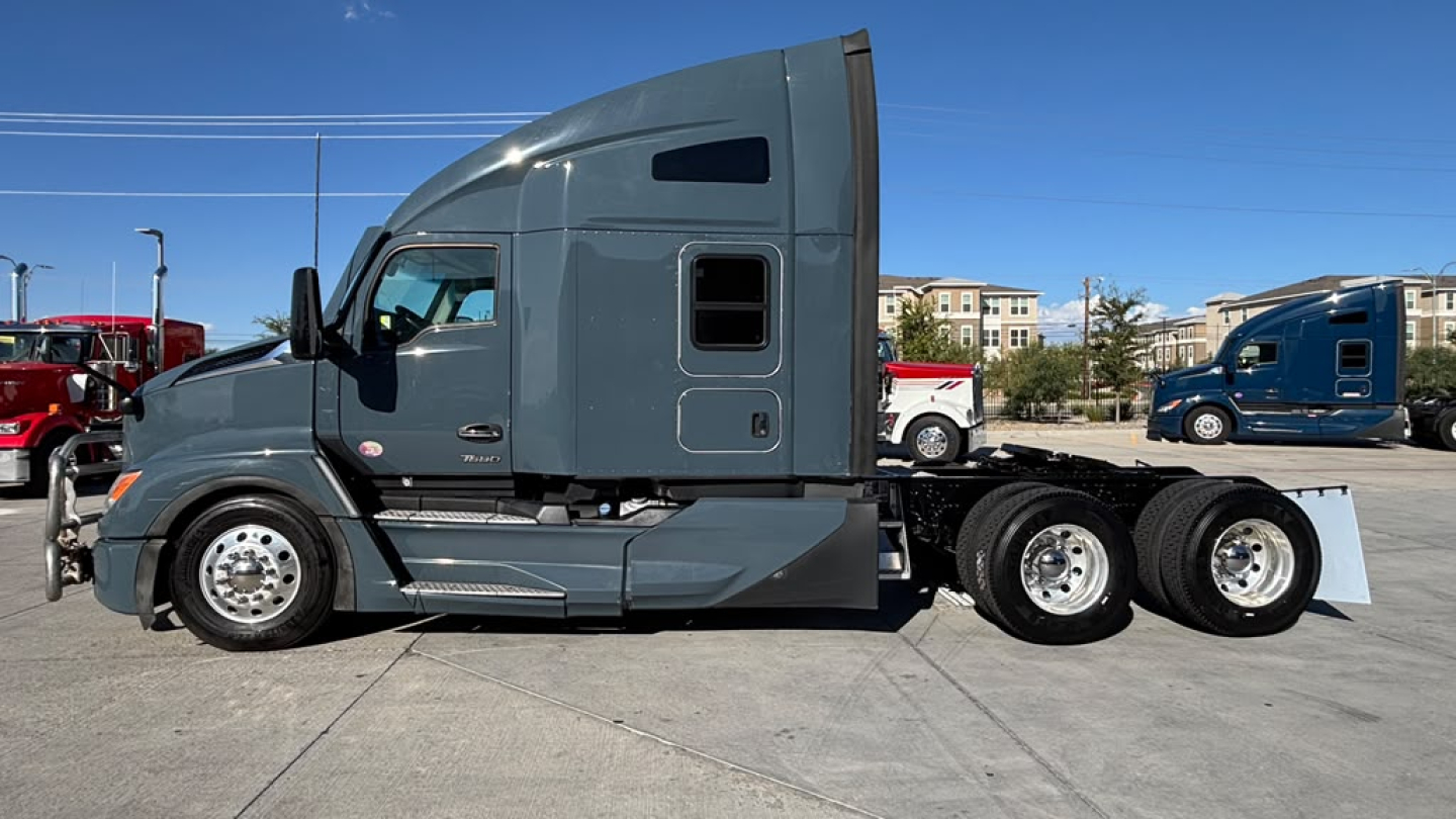 Kenworth T680 6x4 tractor in profile view showing cab, sleeper, and chassis with dual rear axles and chrome wheels.