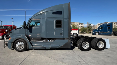 Kenworth T680 6x4 tractor in profile view showing cab, sleeper, and chassis with dual rear axles and chrome wheels.