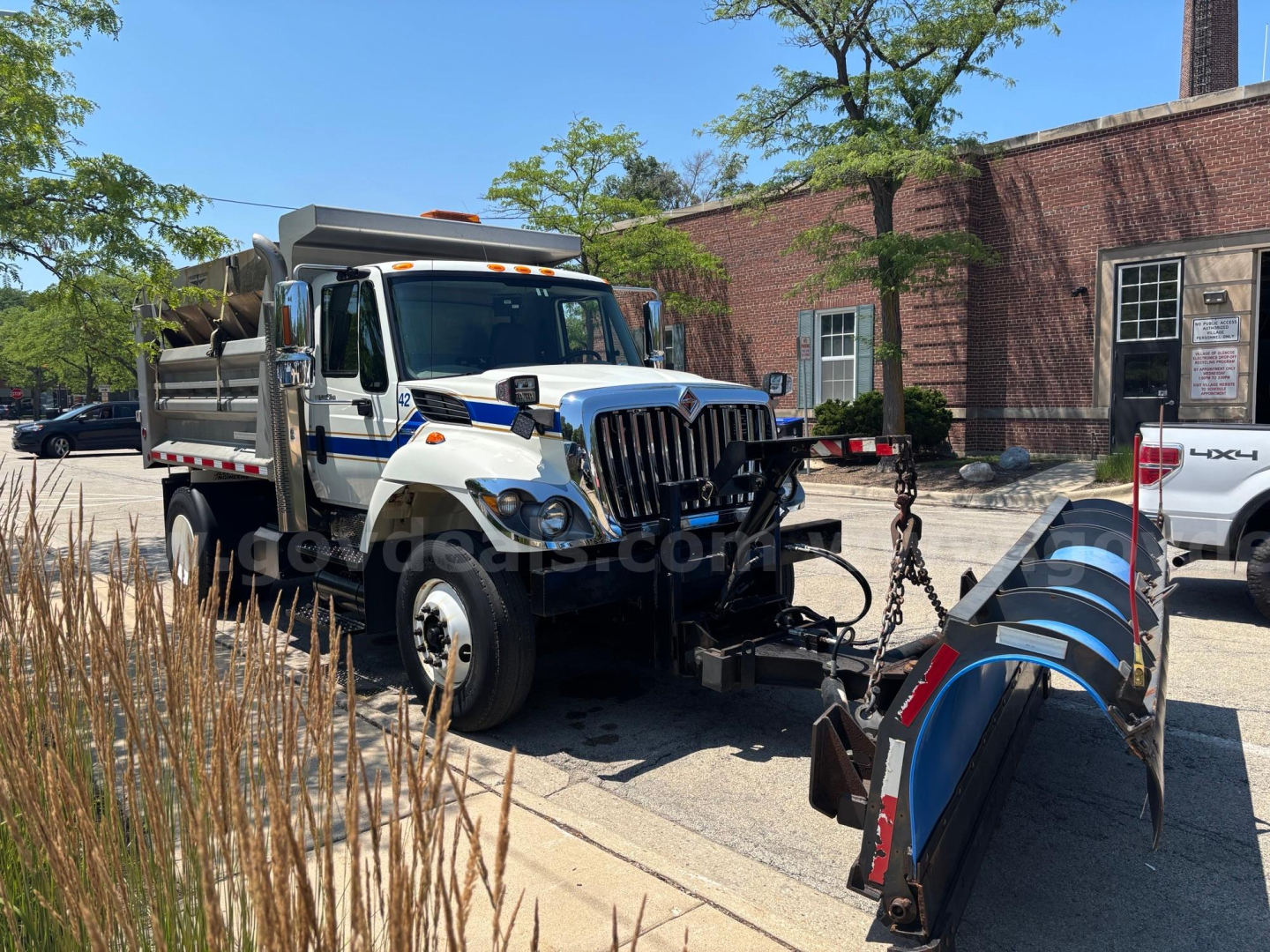 2009 International 7400 utility truck with snow plow attachment, front view, in-service condition, stock number 264-10.
