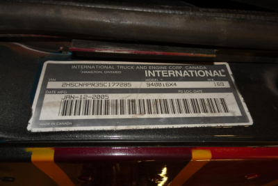 Label showing VIN 2HSCNAPR35C177285 and International branding on a truck door tag.