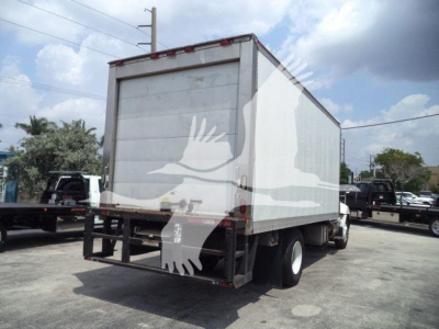 Rear view of a 2015 Hino 268A refrigerated truck with a closed box body and dual rear wheels.