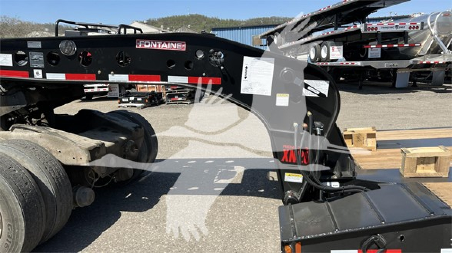 Fontaine Renegade XN20 lowboy trailer frame showing hitch and hydraulic components with Fontaine branding.