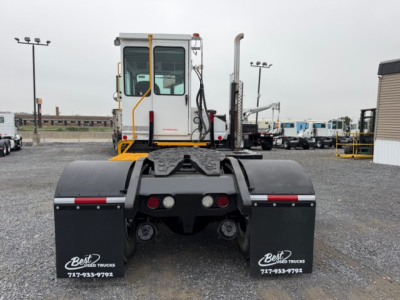 Capacity TJ5000 vehicle rear view showing mud flaps with Best Used Trucks logo and dual rear wheels.