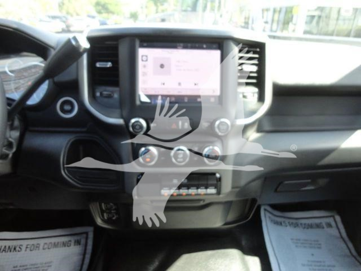 Ram 4500 dashboard view showing infotainment touchscreen and center console with controls.