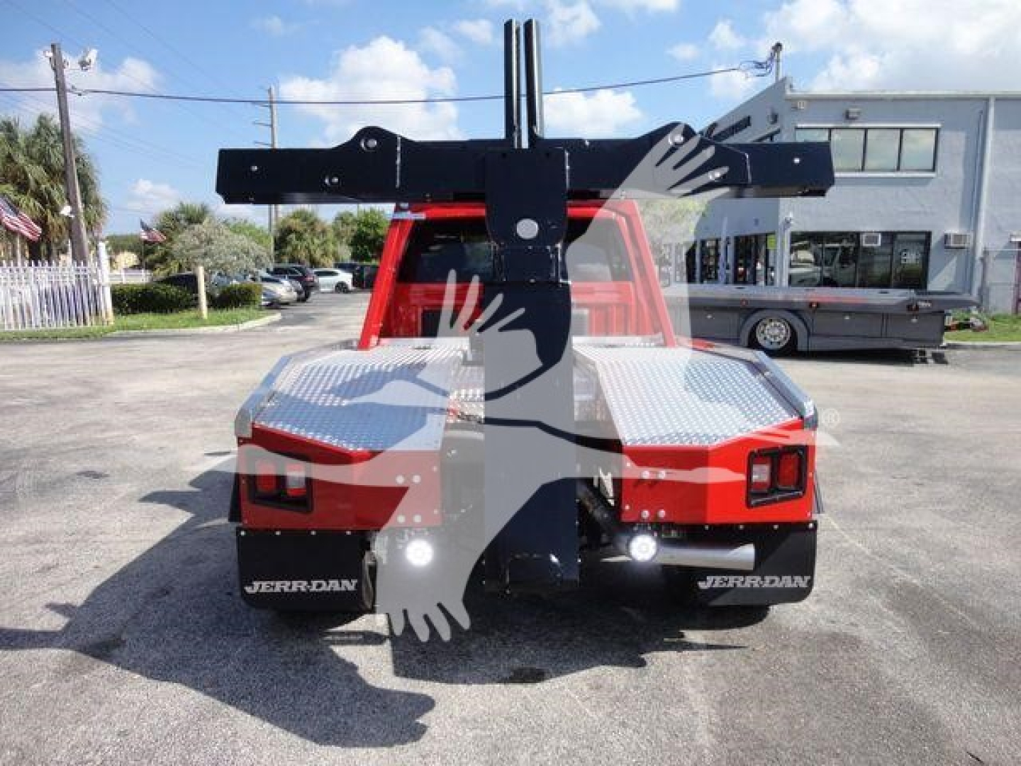 Ram 4500 truck rear view with heavy-duty winch mount and Jerr-Dan branding on fender flares.