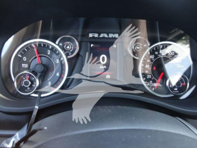 Ram 4500 dashboard showing speedometer and tachometer gauges; digital display with 0 km/h and RAM branding.