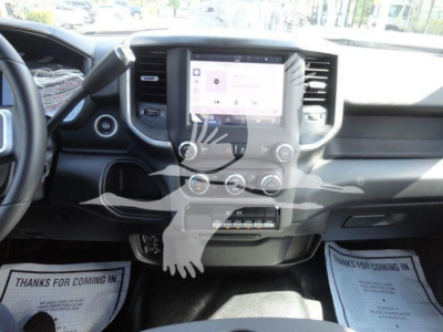 Ram 4500 cabin interior showing center touchscreen, climate controls, and steering wheel.
