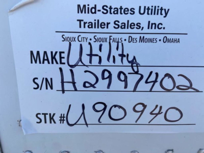 Trailer sticker showing Mid-States Utility Trailer Sales, Inc. branding with handwritten S/N H2999402 and STK # 490940, and list of cities including Sioux City and Omaha.
