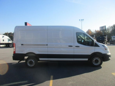 Ford Transit cargo van side view showing blank cargo area and front cab, white exterior, black trim, in a dealership lot.