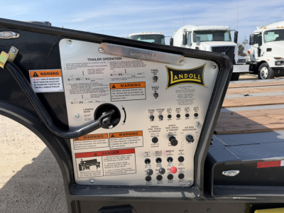 Landoll 455B-53 trailer control panel with warning labels and stickers visible