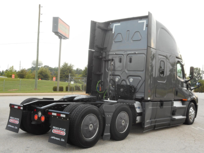 Freightliner Cascadia 126 tractor rear view showing dual rear axles and fifth wheel area.