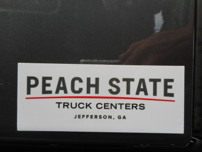 Peach State Trucks Centers sticker on a vehicle showing PEACH STATE TRUCK CENTERS JEFFERSON GA