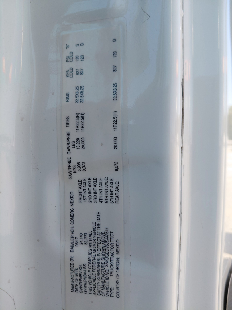 Truck data plate showing manufacturer details, max axle ratings, and other specs for a Freightliner PT126064S T. Text includes CAPACITY, GROSS vehicle weight, and serial numbers.