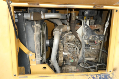 Engine compartment of a 2016 Master Craft C06-10116 diesel engine with hoses, radiator, and hydraulic components visible.