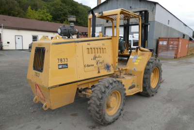 Master Craft C06-10116 forklift showing 7833 on side, C-Series Master Craft logo, and rear view with tires and operator area.
