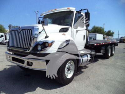 Semi truck from a rollback bed with International Workstar badge; visible text includes VIN 3HAGSSNT6GL226270 and stock number T26270 on listing; no additional legible labels.