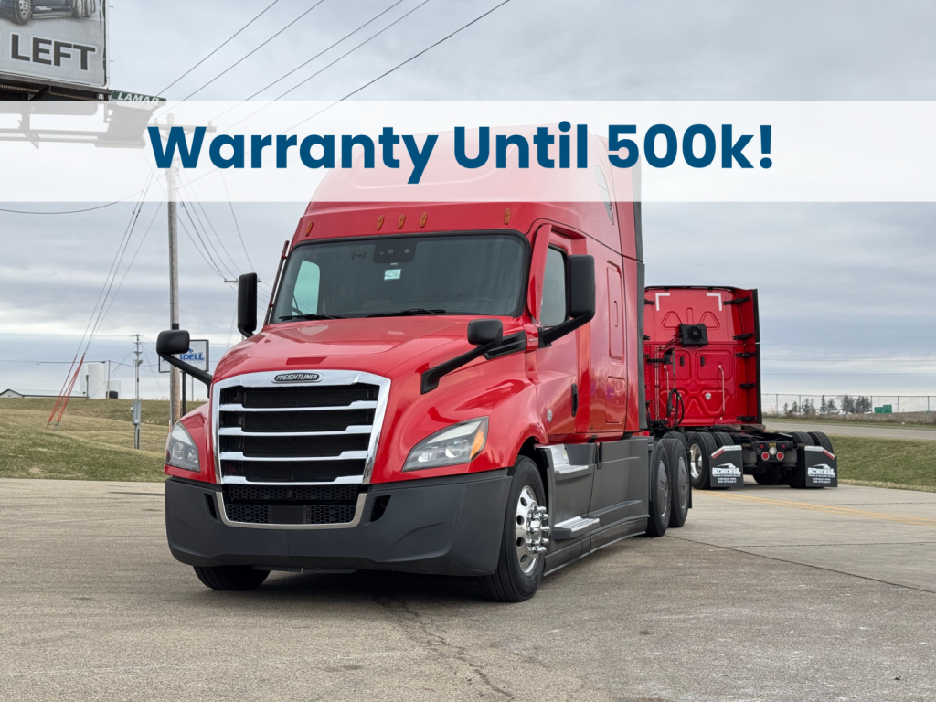 Freightliner Cascadia 126 tractor unit with banner text Warranty Until 500k!