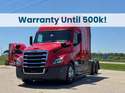 Truck front view showing red Freightliner Cascadia 126 tractor with banner text 'Warranty Until 500k!'