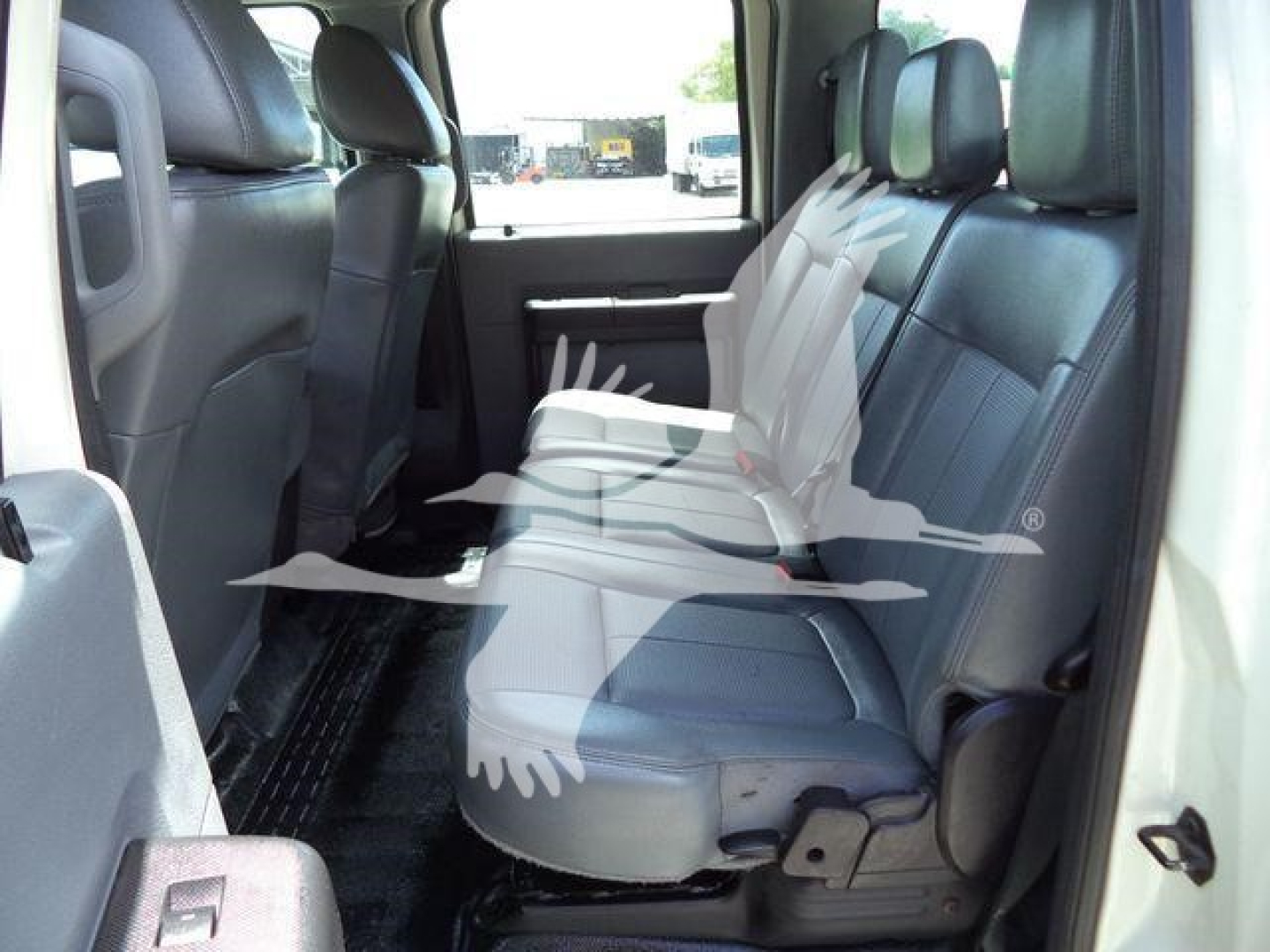Ford F-550 rear interior with seating visible, cargo area not shown.
