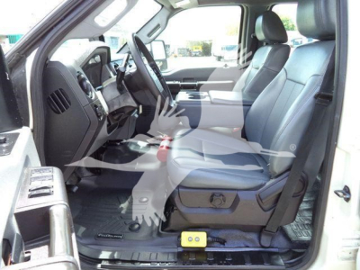 Ford F-550 cab interior showing front seats and dashboard with steering wheel