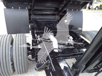 Ford F-550 undercarriage showing drivetrain components and rear axle assembly.