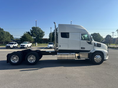 Mack PR64T76M conventional sleeper truck side view showing cab, chassis, and dual rear axles
