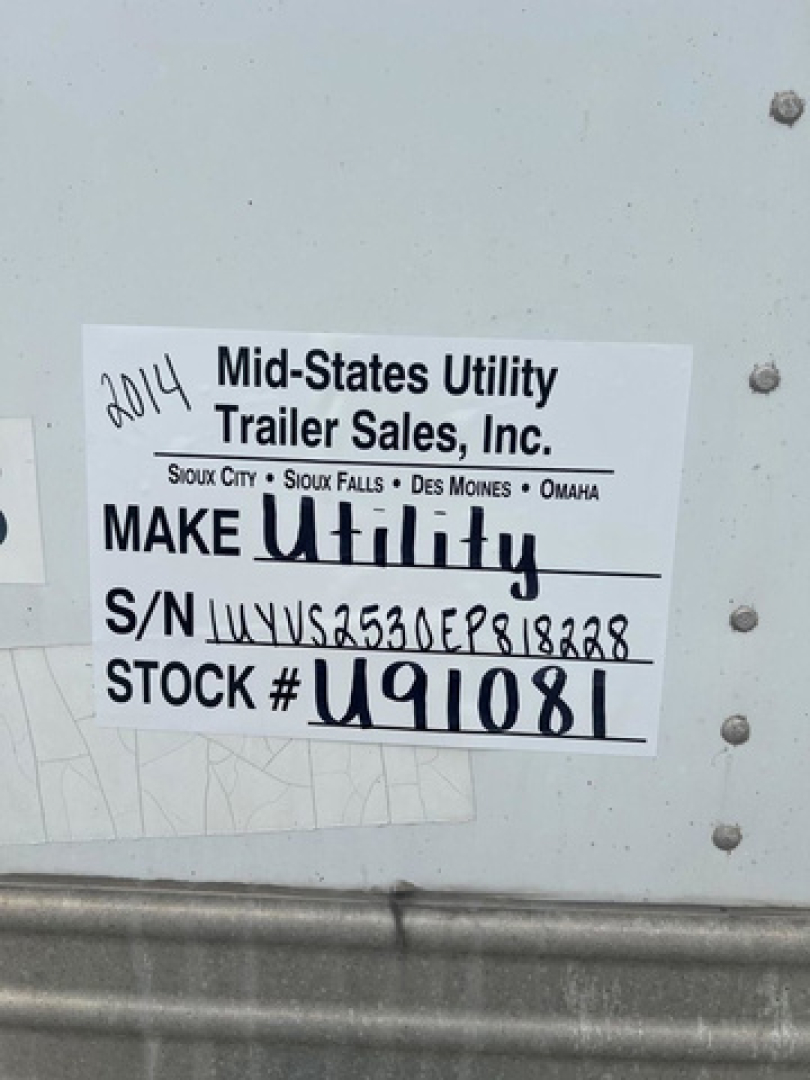 Label on trailer showing make utility, S/N 1UYVS2530EP818228, stock U91081.