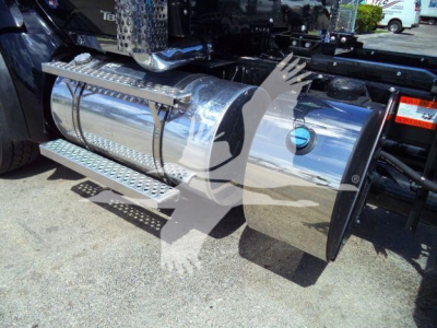 Kenworth T880 fuel tank area with chrome cylindrical tank and steps, showing side view of truck chassis.