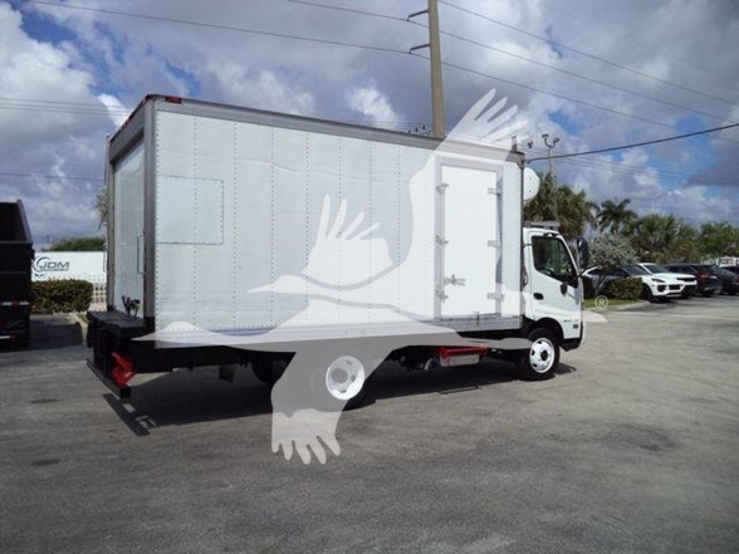 2019 Hino 195 refrigerated box truck with aluminum cargo body, side view showing cab and rear doors and undercarriage.
