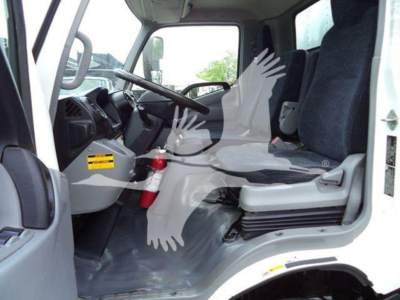 Cab interior of a 2019 Hino 195 refrigerated truck showing driver seat and dashboard area.
