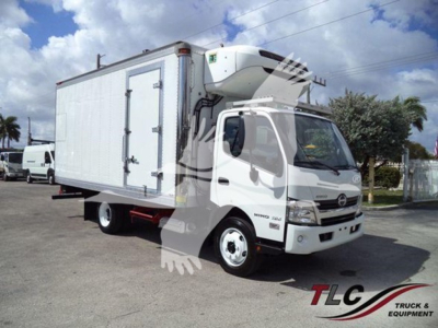 2019 Hino 195 refrigerated truck with a box body and refrigeration unit on top. Text on cab shows Hino branding; no legible model-specific labels visible from distance.