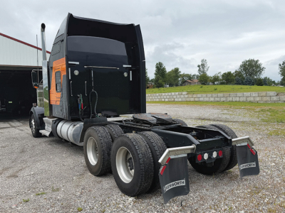 Kenworth W900L AeroCab with sleeper, rear view of fifth wheel area and dual rear axles, stock number 558317.